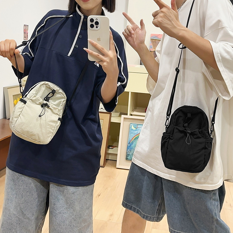 Solid-color nylon fabric bag for women, Spring 2025 new niche waist bag, ins casual pleated phone bag, crossbody bag for women undefined
