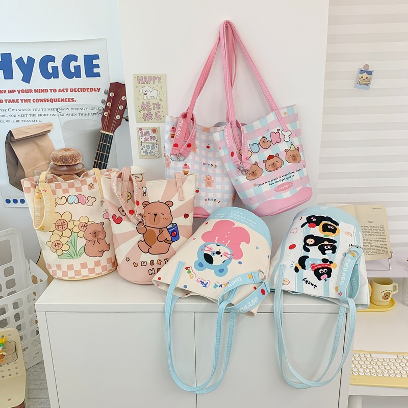 Mochila de hombro para niños y niñas de gran capacidad, nueva bolsa de impresión de aire extranjero para niños