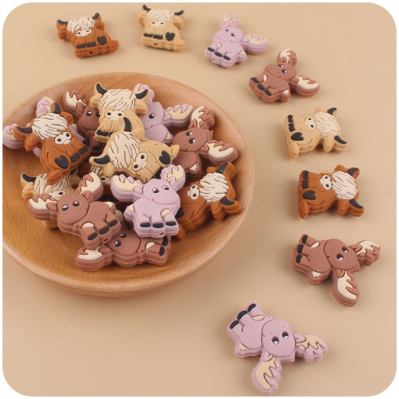 Nuevo bebé de dibujos animados animal yak ELK teether creativo DIY bebé chupete cadena teether pulsera pequeños accesorios