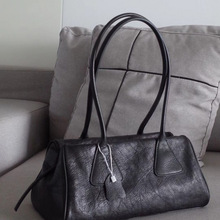 2025秋冬新款植鞣保龄球糖三角腋下法棍包简约长手柄