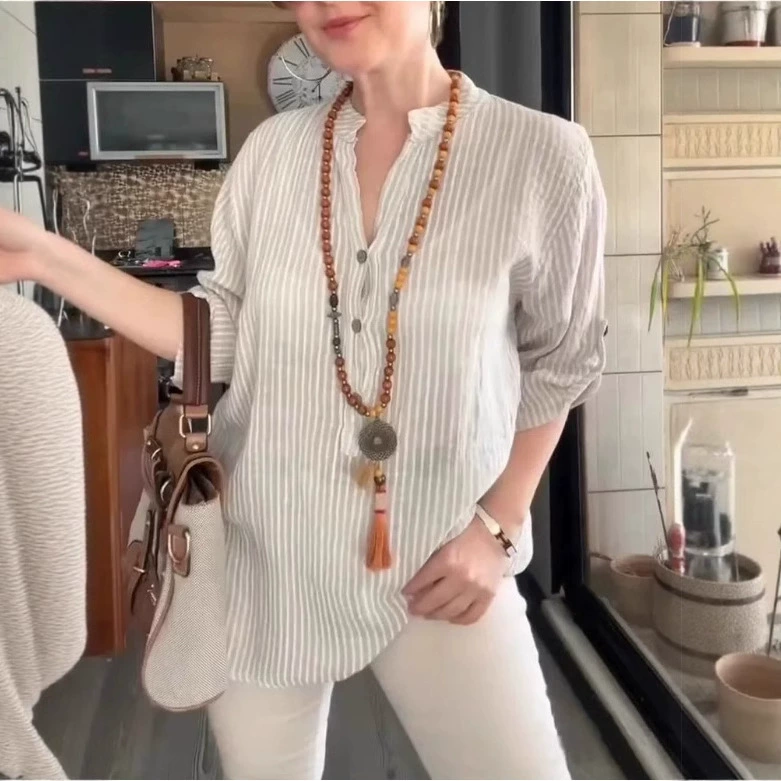 Трансграничная экспортная новая летняя европейская и американская элегантная женская рубашка с V-образным вырезом и рукавом три четверти в полоску Amazon 2025 года.