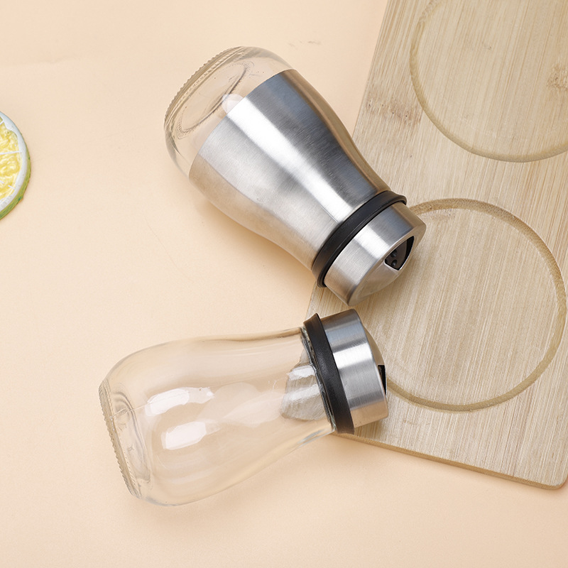Botella de condimento de acero inoxidable al por mayor Botella de pimienta de sal Botella de pimienta giratoria Botella de condimento de vidrio de cocina multifuncional