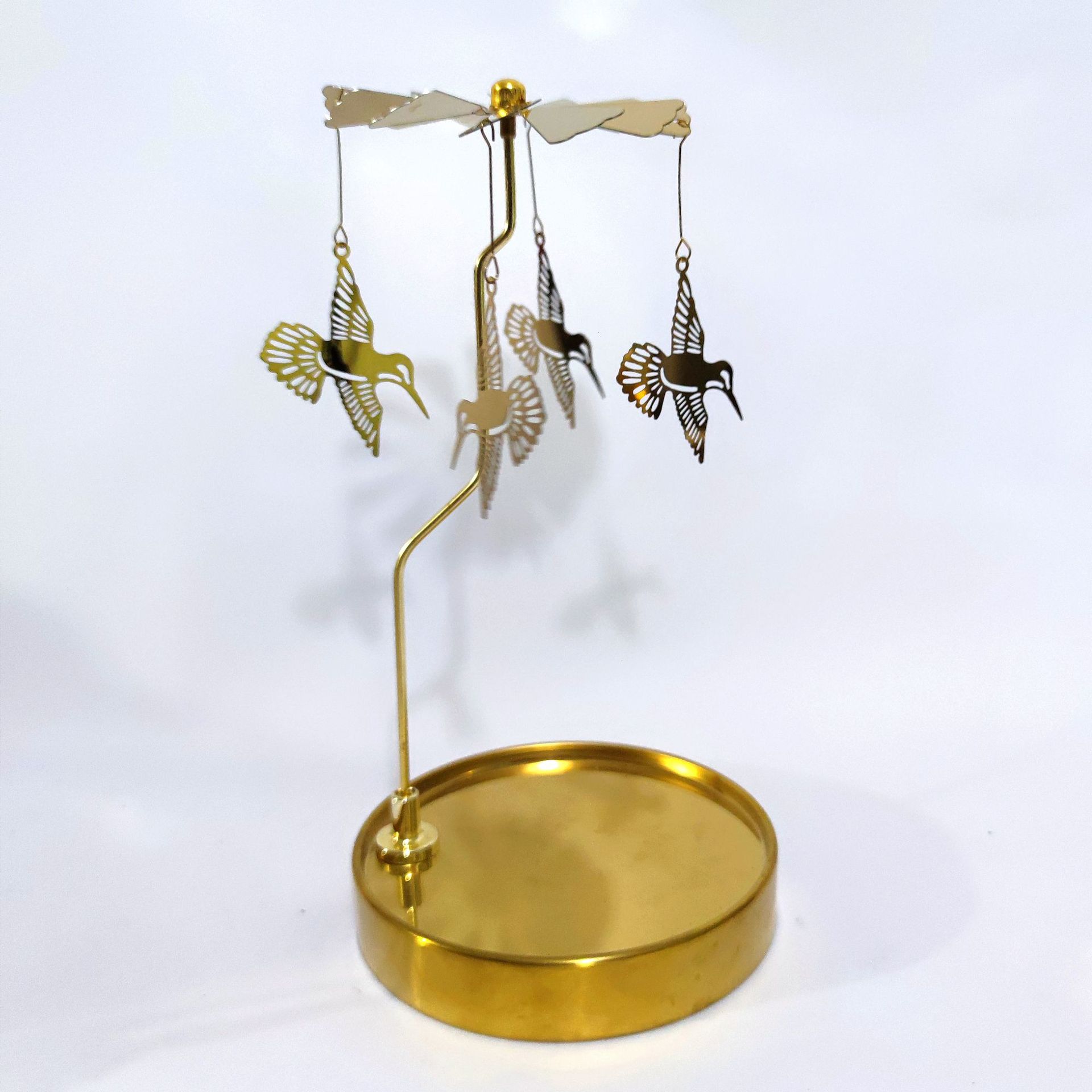 Fuente fabricante al por mayor Amazon INS bandeja redonda de acero inoxidable linterna giratoria giratoria candelabro de aromaterapia giratoria