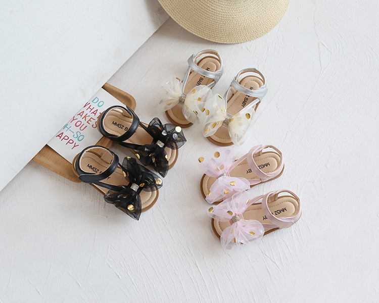 Versione coreana di fiori dolci da bambina con grande fiocco, scarpe per bambini, sandali per le vacanze al mare, estate 2021_voghion.com