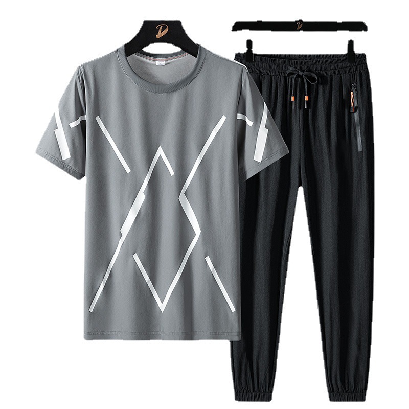 Gran tamaño de ropa de hombre de verano traje deportivo casual hombre camiseta de cuello redondo impresión de tendencia de dos pantalones largos