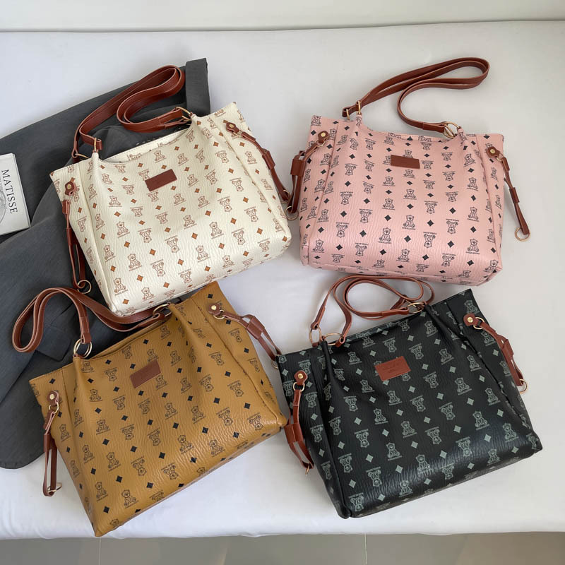 Retro 2025 nuevo estilo de moda de viaje de hombro bolso de brazo de mujer textura universal bolso de mano gran capacidad