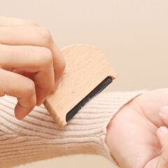 クロスボーダーのコートの毛を剃る器の服は毛を剃ります。