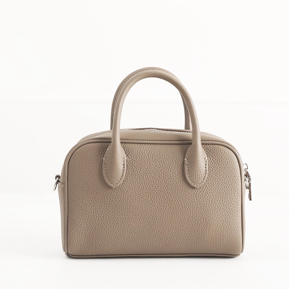 韓国版の第一層牛革ボウリングバッグレディースバッグハンドバッグメッセンジャーバッグボストンバッグ本革スモールバッグ