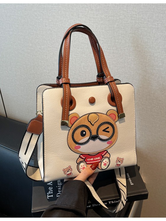 Bolso Tote transfronterizo para mujer de gran capacidad 2025 nuevo bolso bandolera de banda ancha salvaje de verano bolso de clase portátil de ocio