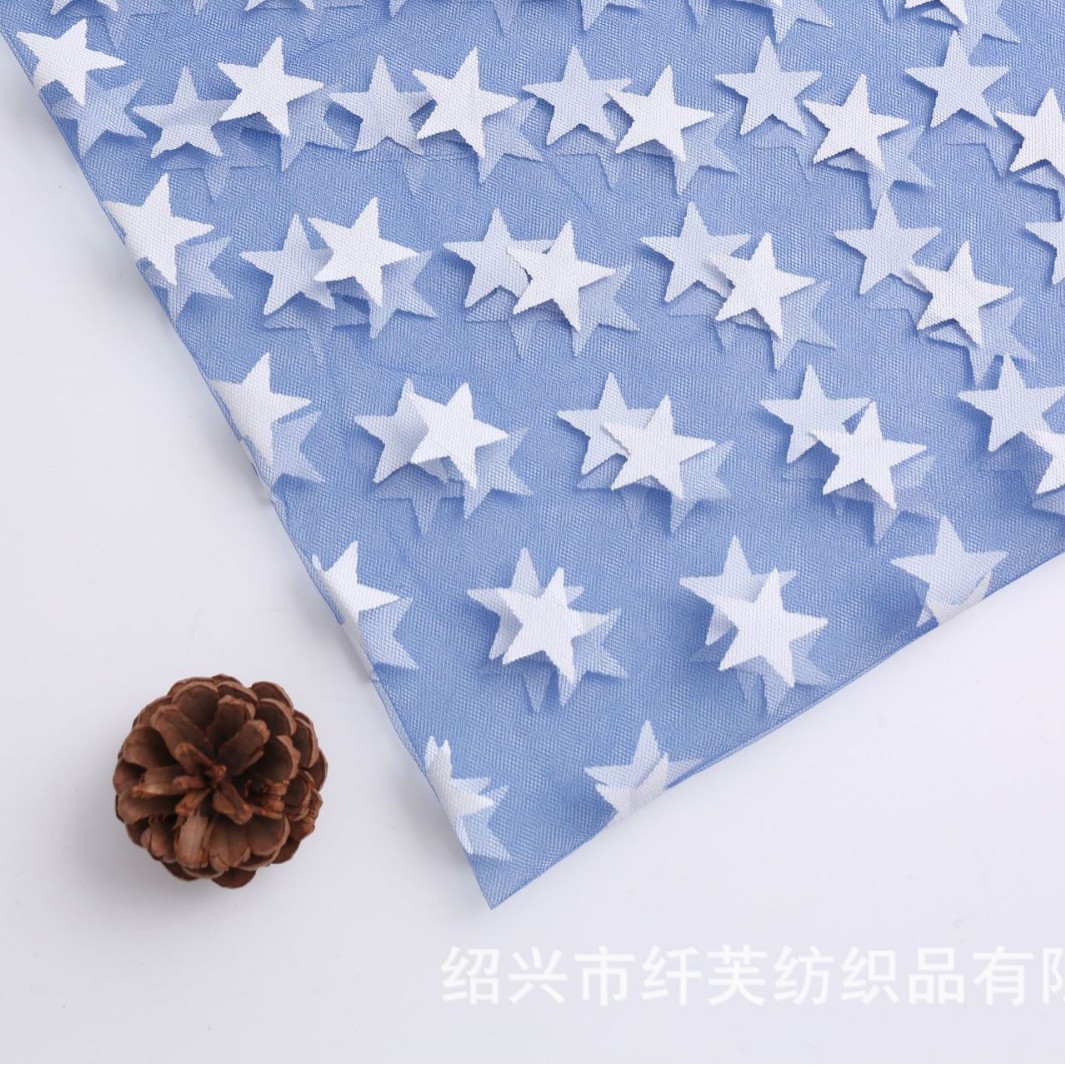 厂家直销中硬美国网深蓝色印花白色大星星童装蓬蓬裙网纱面料