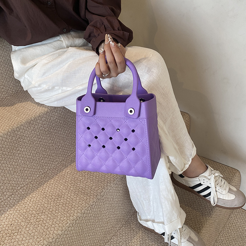 Bolso Tote de moda coreana 2025 verano nuevo estilo bolso femenino agujero hueco bolso de mano moda ringge bolso de playa marea