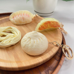趣味の創意シミュレーション食品焼き餃子饅頭小自動車のキーホルダーのチェーンリングの飾り付けの学生プレゼント