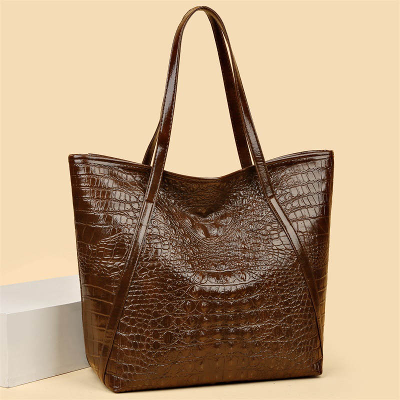 Bolso de mujer de textura nueva transfronteriza, bolso de hombro de gran capacidad, válvula de reparación de almacén de bloqueo de moda de todo fósforo, reducir el fuego y refrescarse