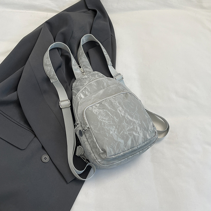 Nuevos productos de cuero suave pu doble uso bolso de pecho de moda de mujer impresión de tendencia nueva mochila china textura mochila pequeña