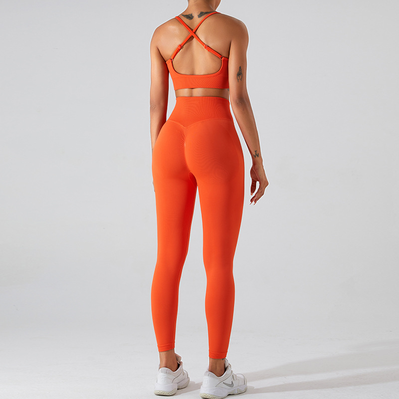 Europa y América nueva ropa de yoga sin costuras traje de las mujeres espalda cruzada ropa interior deportiva Peach Hip lifting pantalones de yoga de secado rápido