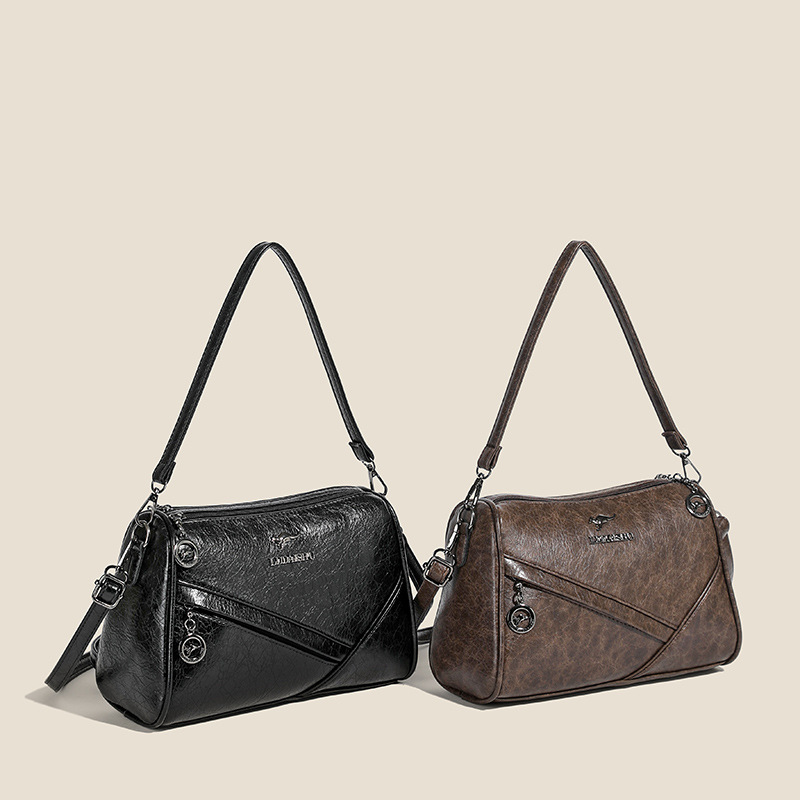 2024 nueva moda atmósfera bolso de hombro de gran capacidad bolso de mochila ligero urbano simple temperamento universal bolso de mujer