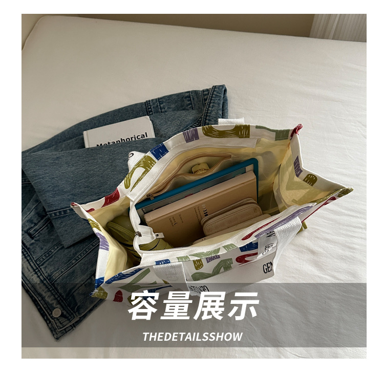 Large-capacity letter canvas bag 2025 new style ins printed versatile shoulder bag for commuting and portable ladies' tote bag undefined
