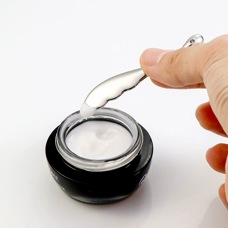 Eye cream, metal cosmetic massager, easy application