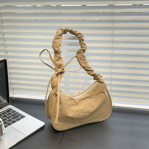 In-stock French-style nylon drawstring underarm bag 2026 new model, solid color fresh shoulder bag, fashionable versatile casual bag