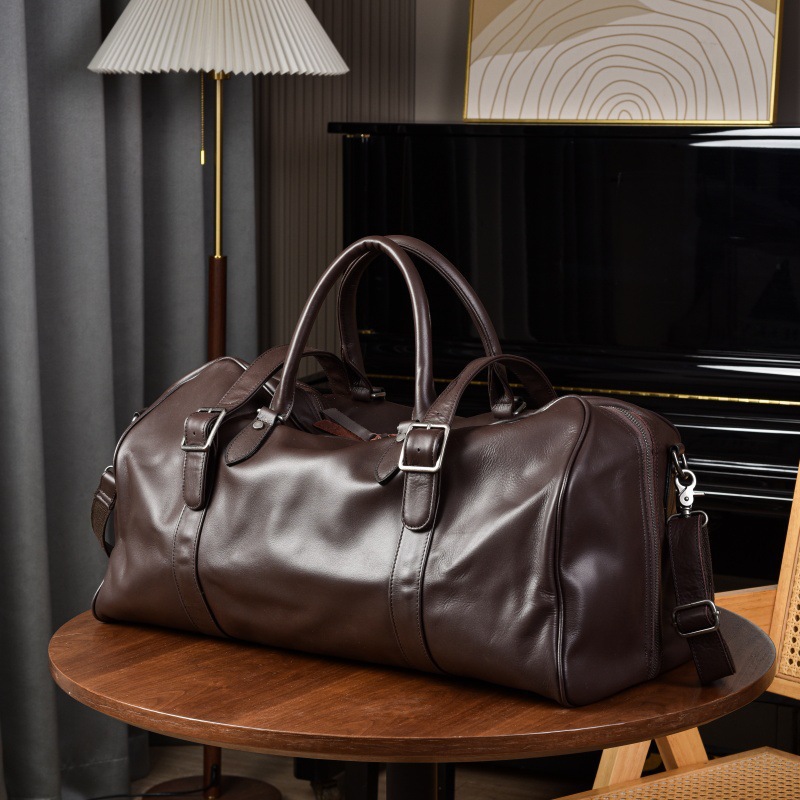Cross-border vegetable tanned leather luggage bags for men and women, sports and fitness bags, genuine leather business handbags, short-distance outdoor travel bags