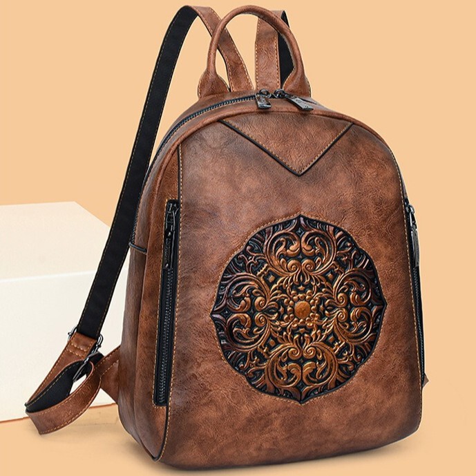 Cross-border handmade leather-carved ethnic-style backpack with a textured feel, large capacity, suitable for casual commuting, versatile women's backpack