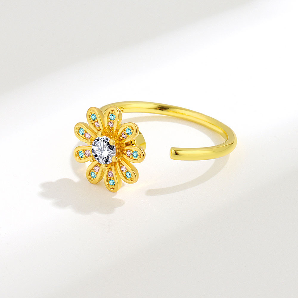 Europa y América transfronteriza Venta caliente anillo giratorio hembra apertura giratoria ajustable circón flor anillo temperamento anillo