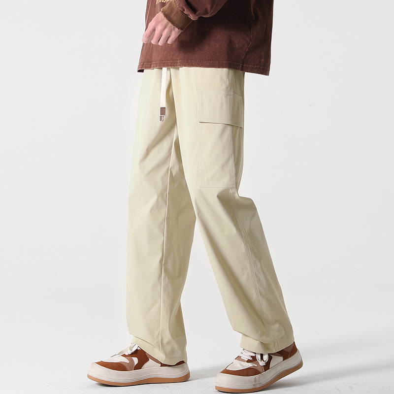 Pantalones rectos pantalones de pierna ancha para hombres primavera y otoño color sólido ropa de trabajo multibolsillos pantalones sueltos casuales de manga larga sensación de drapeado de moda