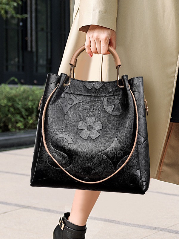 Bolso de mano de nuevo estilo para mujer, bolso tote de gran capacidad de alta gama, bolso de mano moderno con relieve y bolso interior extraíble.