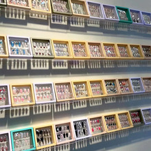 置物架墙上免打孔挂墙儿童书本穿戴甲收纳架壁挂化妆品亚克力书架