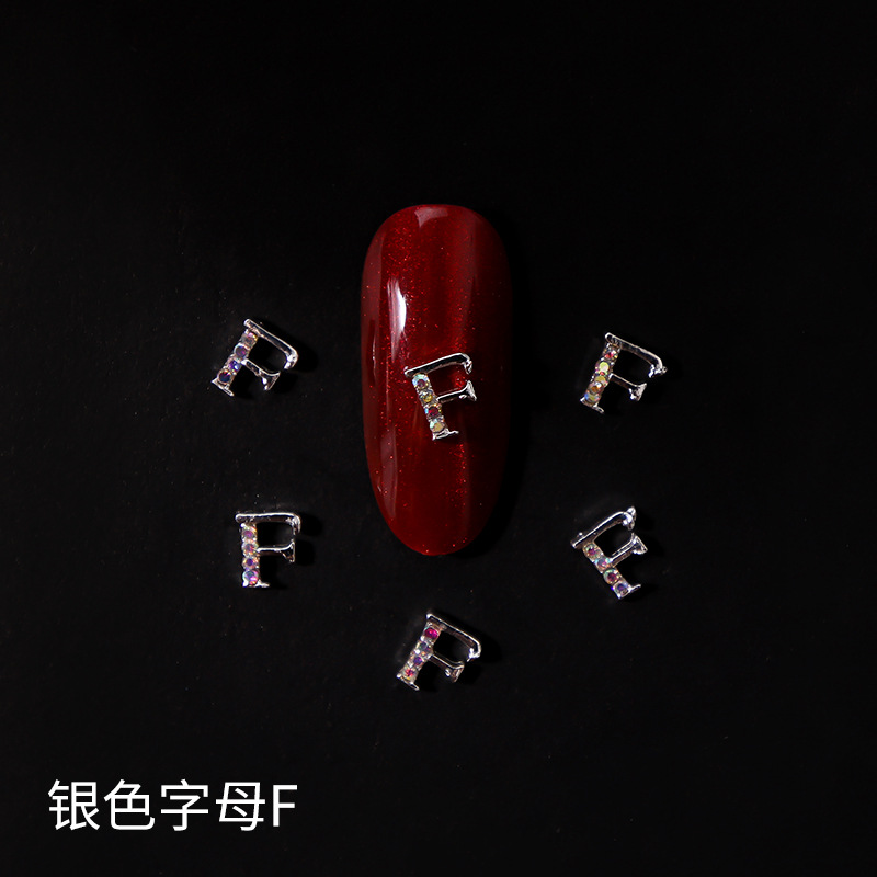 Nueva LZ manicura 26 letras aleación joyería estilo japonés Internet celebridad plata letras manicura joyería clavo Taladro