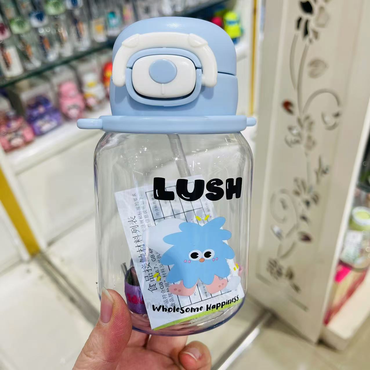 Taza de agua de muñeca de dibujos animados de Jinshi Botella de agua portátil de 600ml para estudiantes masculinos y femeninos Taza de deportes al aire libre de alto valor Taza de paja