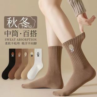 Zhuji socks women's spring, autumn and winter mid-calf length socks solid color vertical stripes boneless sports sweat-absorbent stockings ins tide stockings