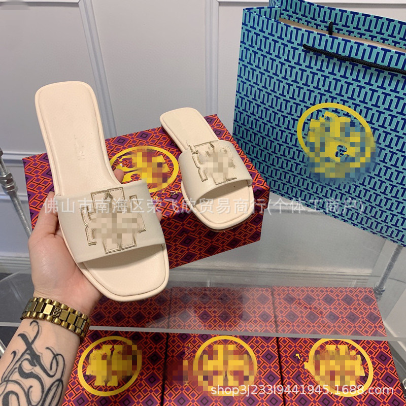 Comercio exterior TB hogar 2024 zapatillas planas huecas desgaste exterior de las mujeres Sandalias de tacón alto de moda Zapatos de una sola capa de piel de oveja alta de una línea