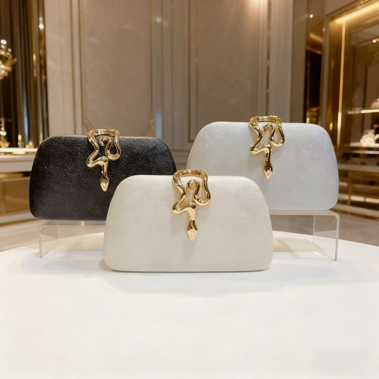 Transfronterizos damas lujosas cadenas bolsas de cena de cerradura de serpiente bolsas de noche de boda de alto nivel bolsas de mano