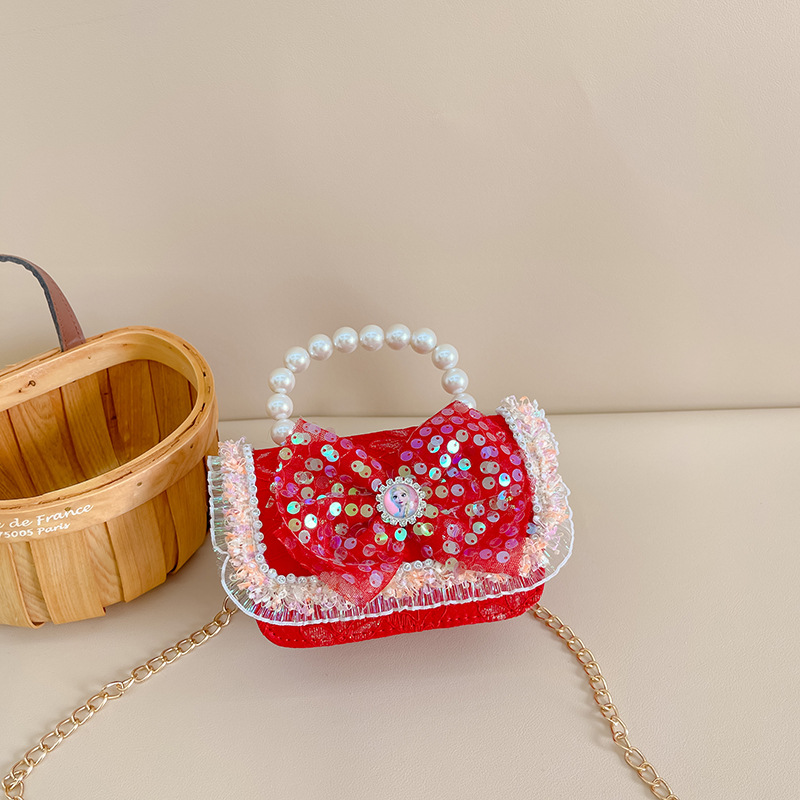 Primavera y verano nueva celebridad en línea bolso de los niños moda Chanel estilo princesa bolsa pequeña niña linda bolsa de mensajero portátil al por mayor