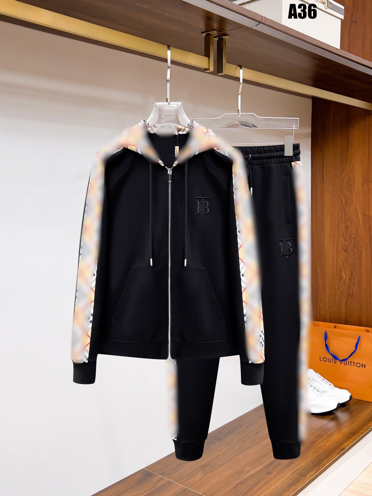 25 años de otoño y invierno de alta calidad nuevo estilo P casa marca de moda cardigan casual suéter deportivo conjunto de parejas