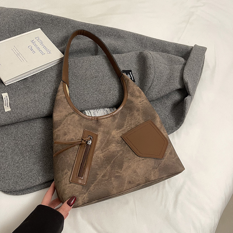 Bolsa de viaje multi-bolsillo 2025, primavera, nuevo retro versátil bolso de hombro de clase, bolsa de gran capacidad para mujeres