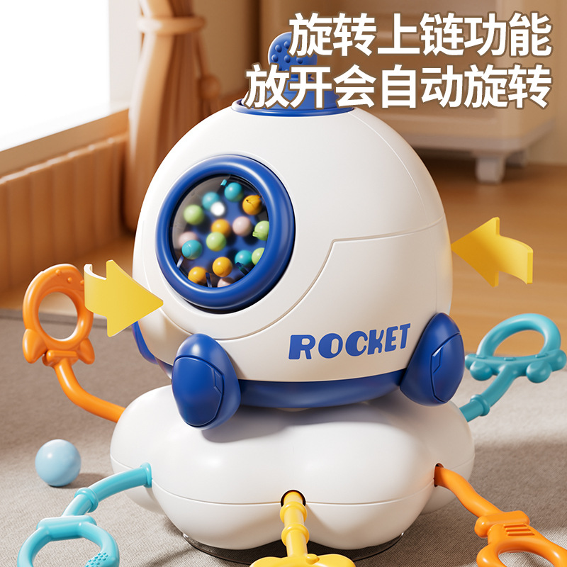 Cohete de bebé transfronterizo Lala Le Educación temprana Educación de la primera infancia Ejercicio de bola de extracción de dedo Juguete de música giratoria de ventosa