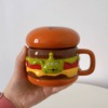 Underglaze color laid ceramic mug cup founded body big -eyed burger cup sealed loosecop model large capacity water cup