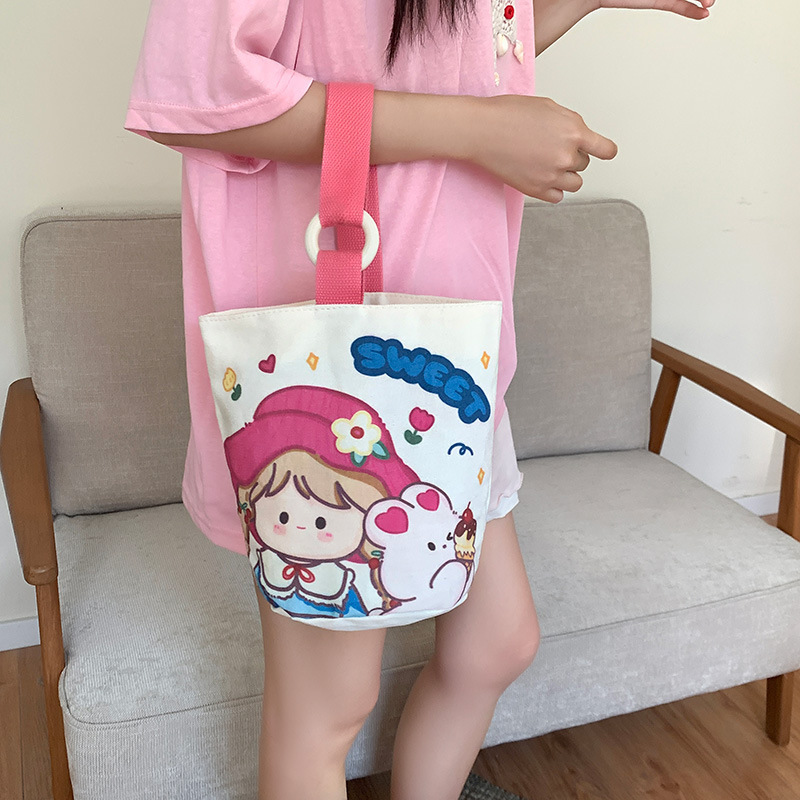 Cute and Sweet Small Bag 2025 New Canvas Bag Women's Large Capacity Portable Bucket Bag Commuter Lunch Box Bag Wholesale Cute and Sweet Small Bag 2025 New Canvas Bag Women's Large Capacity Portable Bucket Bag Commuter Lunch Box Bag Wholesale