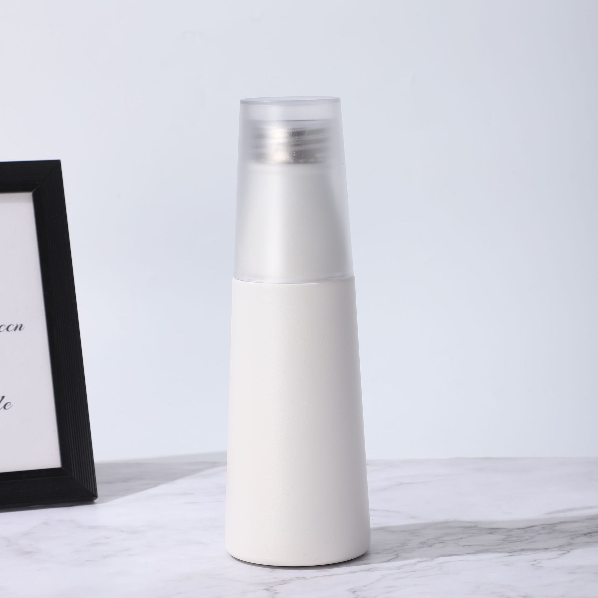 Nuevo espacio simple taza 304 taza de vacío de acero inoxidable una cubierta de doble uso portátil taza de agua pareja taza fábrica al por mayor