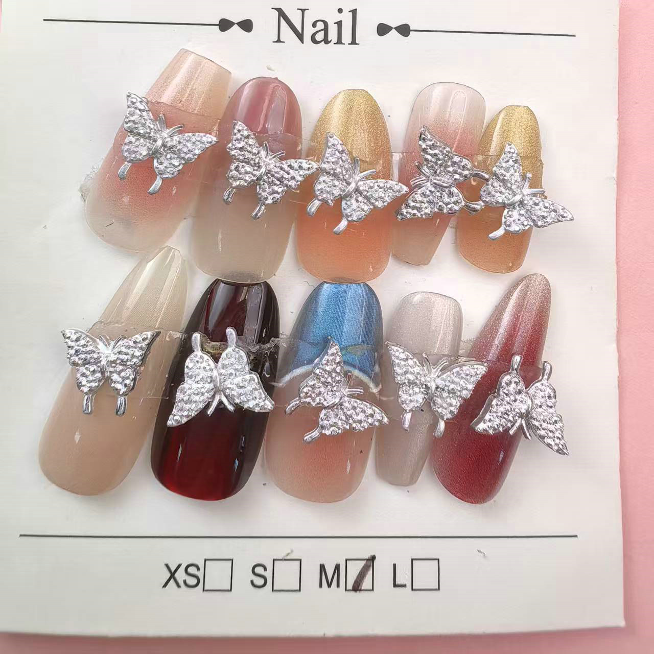 银色树脂蝴蝶美甲饰品批发_09.jpg