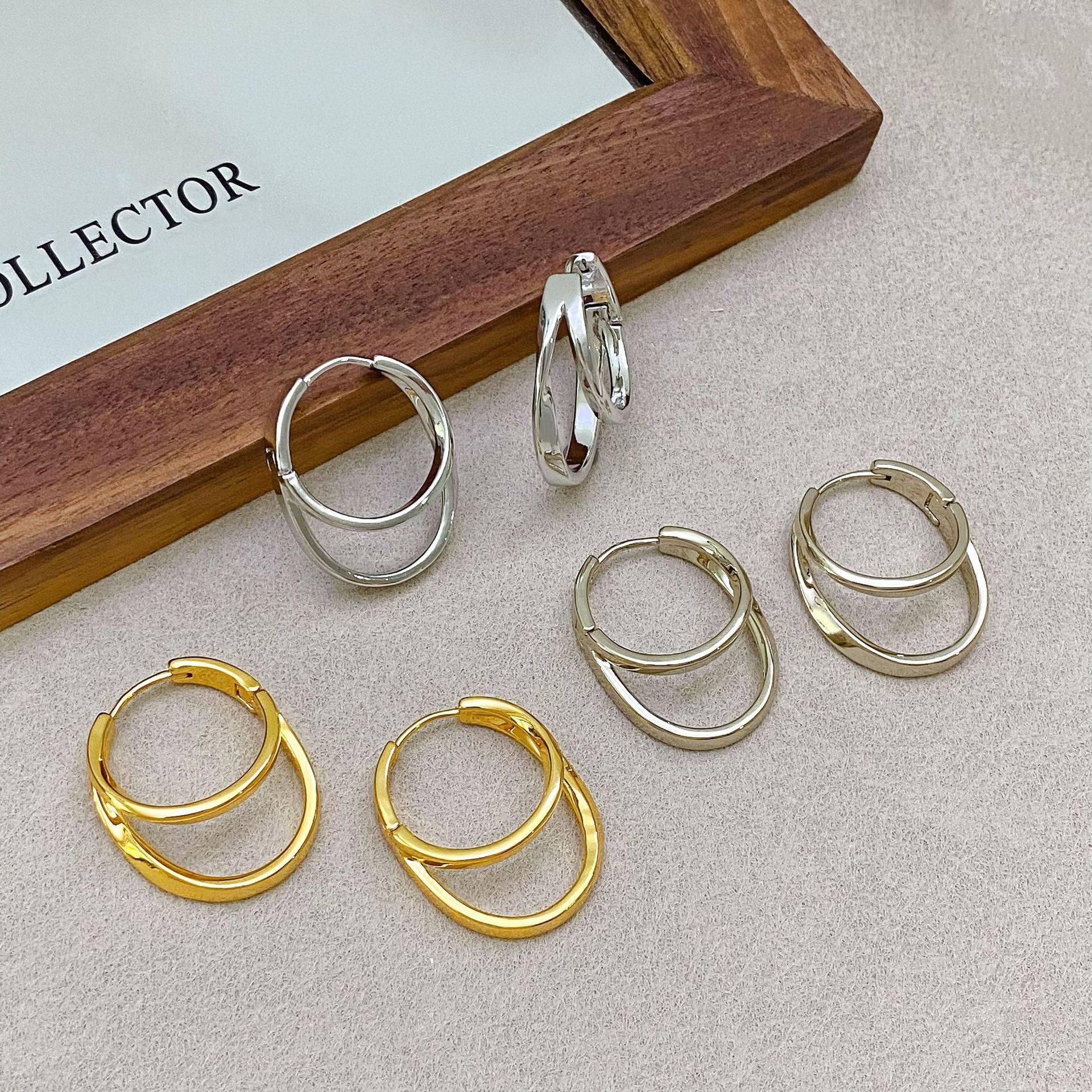 Copper plated with real gold, European and American style cross-border double-layered interlaced hoop earrings for women, new cool and unique fashion earrings