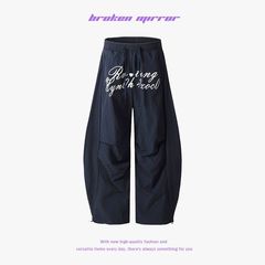 Broken Mirror 25春の新商品はアメリカ街のファッションプリントのカジュアルなカーブの長ズボンを撮影します。