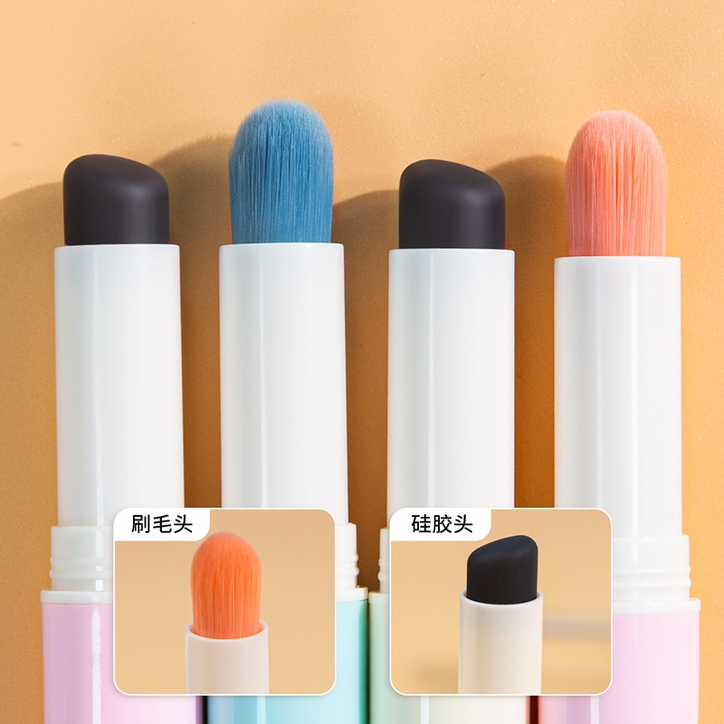 Lápiz labial en forma de cepillo de labios de silicona retráctil Q suave portátil a prueba de polvo mini lápiz labial brillo de labios floreciente cepillo de maquillaje con tapa