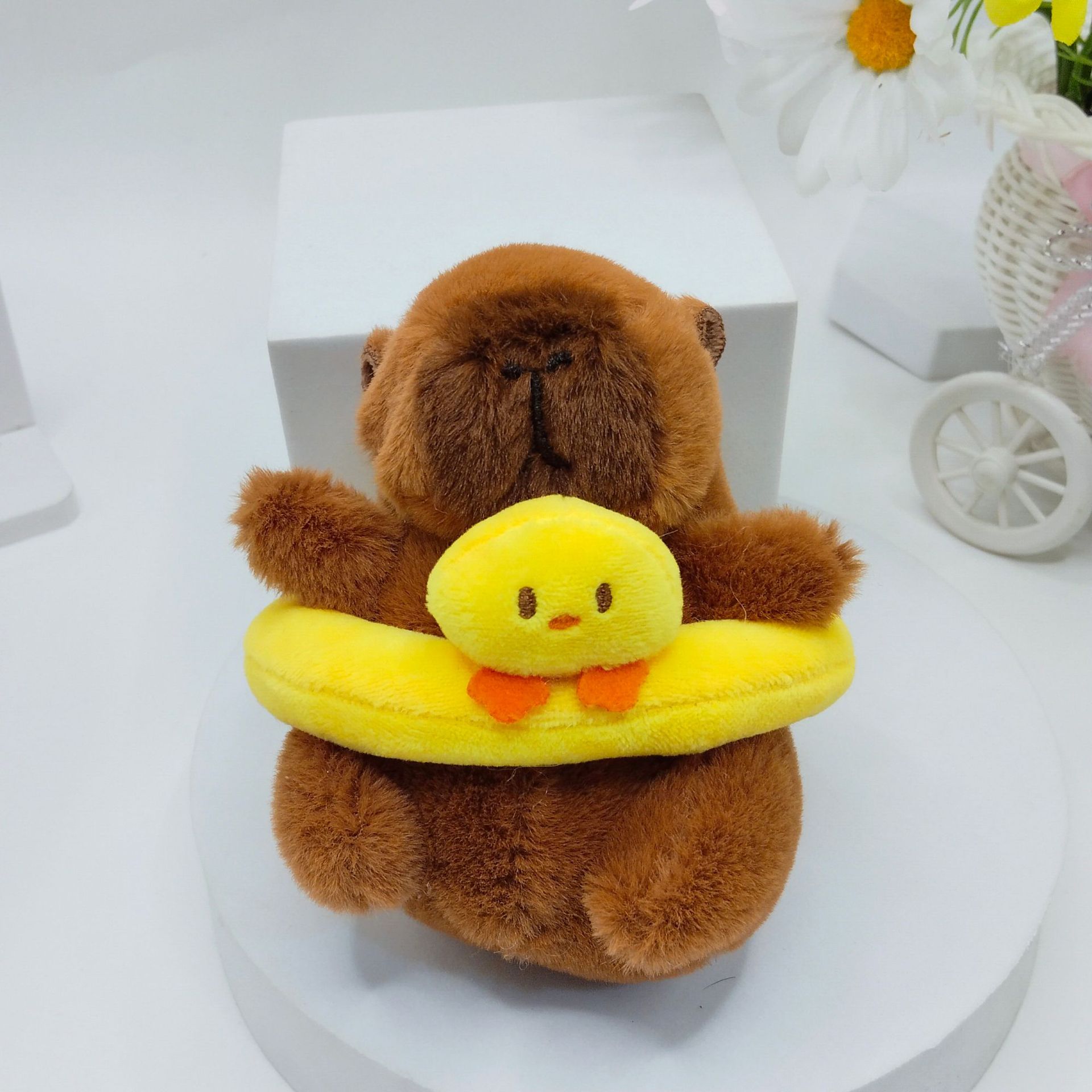 Net red explosions Kapibala swimming ring plush capybara small pendant baby catching machine doll wholesale doll ornaments