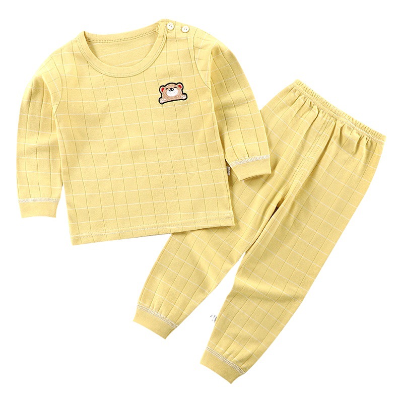 Conjunto de ropa interior infantil otoño-invierno 2025, nuevo algodón puro, ropa térmica para niños y niñas, ropa de casa para bebés, venta al por mayor.
