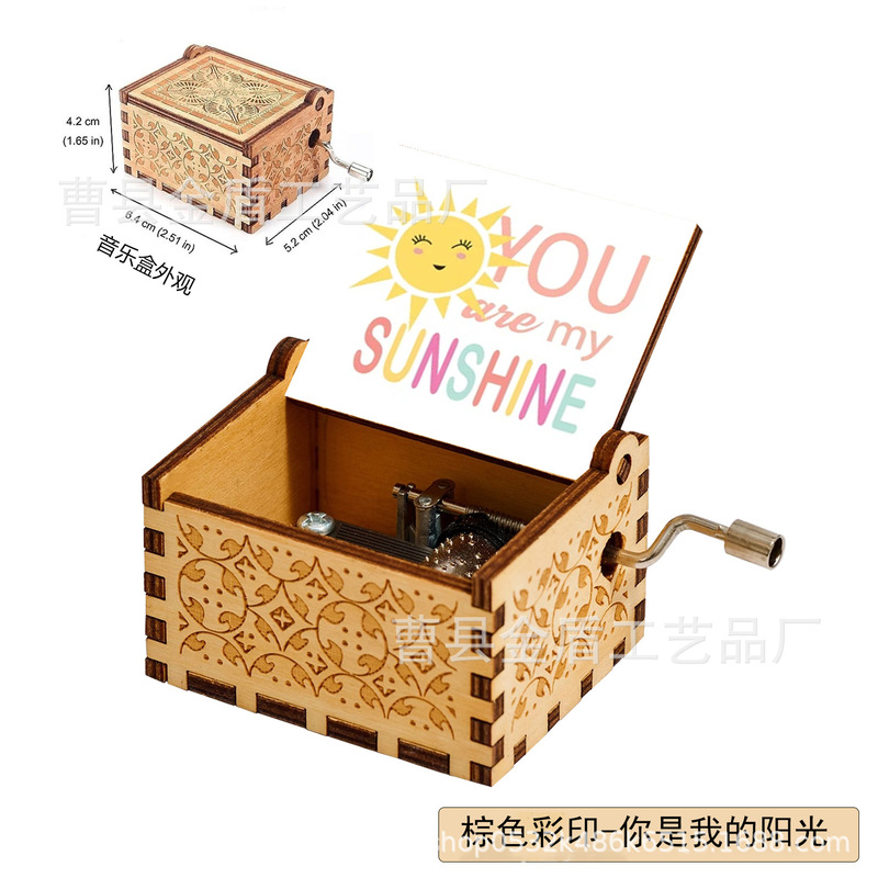 木製の手で音楽箱のアイデアを揺らします。|undefined