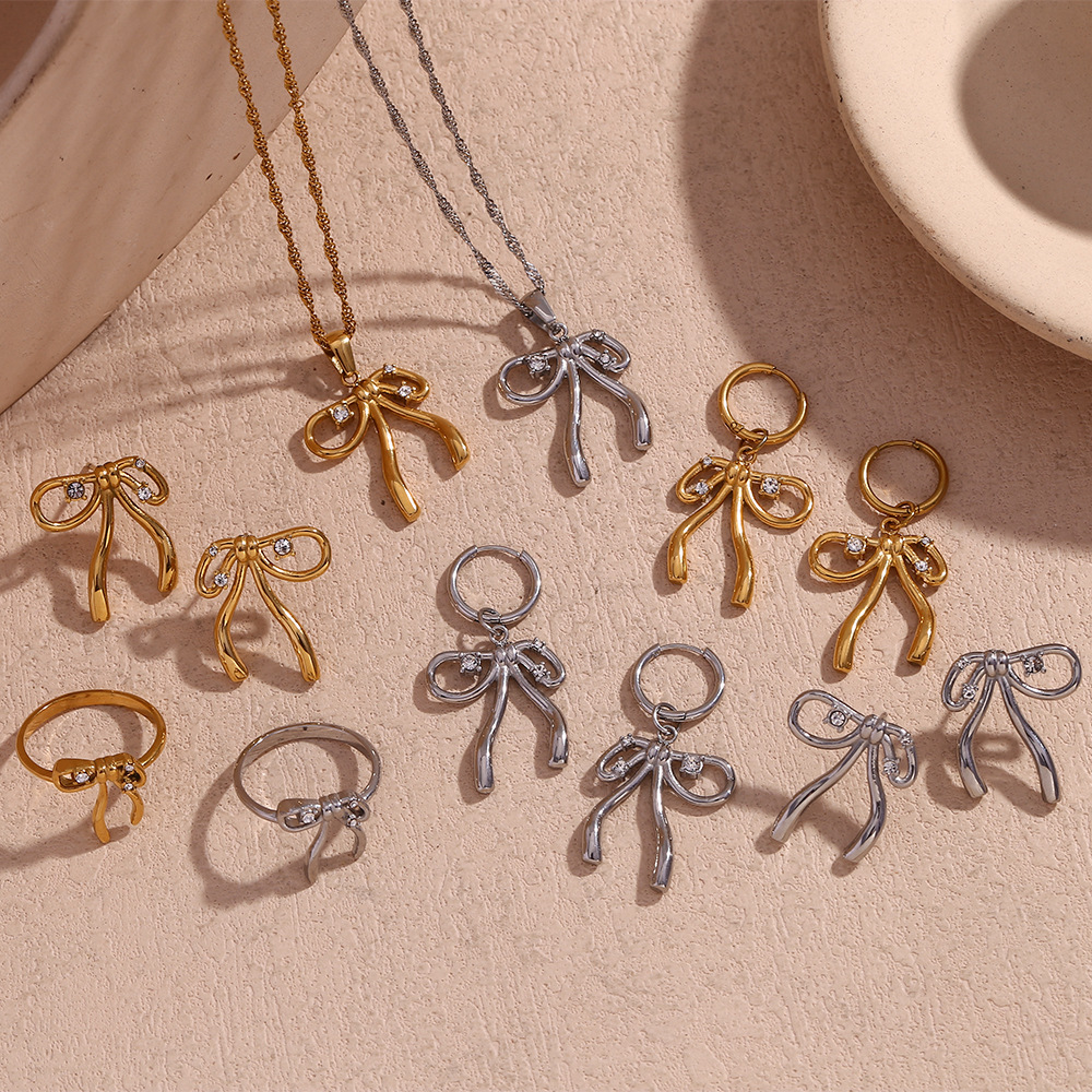 Fairy Style Rhinestone Inlaid Bow Knot Stainless Steel Pendant Necklace Earrings Ring Sets