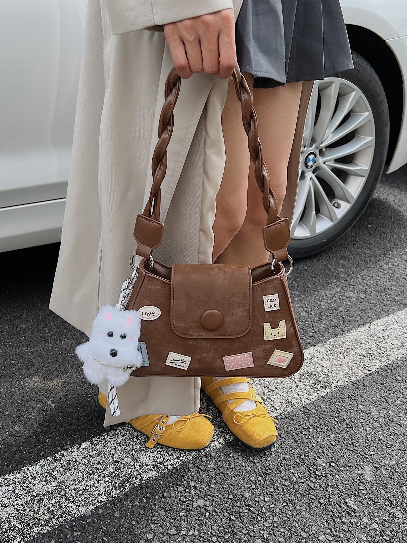 Popularidad transfronteriza simple bolso de brazo para mujeres 2025 nuevo estilo de estilo universal bolso de hombro extranjero textura de moda bolso de mochila super caliente